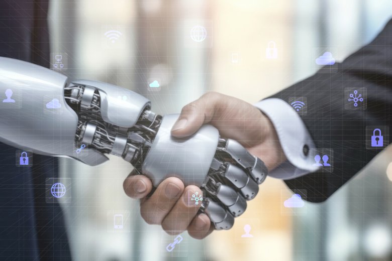 ロボットと人間が握手